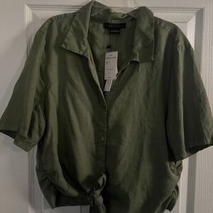 Sanctuary button upTop